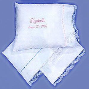 Lace Pillow in white with lace trim and pink or blue satin ribbon